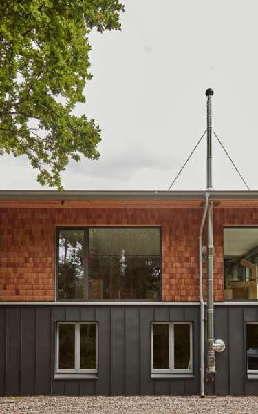 Half’n’half cladding with wood and steel, Schleusenberg 1, 23896 Panten